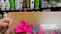 Asian Ladyboy Teases with Fresh Thong Display in Local Convenience Store Setting.