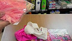 Asian Ladyboy Teases with Fresh Thong Display in Local Convenience Store Setting.
