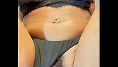 A woman in lingerie masturbates solo and cums.