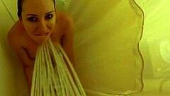 brett rossi lathers up her curvy blonde body in a steamy shower scene