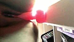 in this solo scene, a fat ebony woman rips her clothes and drips from her pussy with a dildo