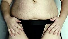 Chubby gay man shows off big tits and ass in anal sex