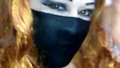 masked black babe uses dildo