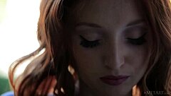 Redhead babe Michelle H strips down boldly