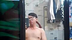 Vietnamese gay top with tattoos chats casually