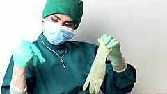 Nurse plays with latex gloves in hospital