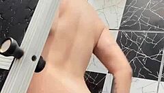 I admire Sko Ella's tattooed pussy and tits in the shower.