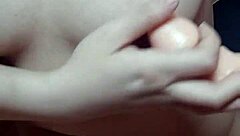 Asian milf inserts huge toy deep into tight slit