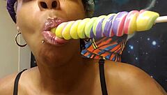 ebony babe black fetish sucking unicorn lollipop