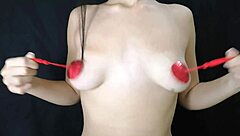 Young girl is playing her natural tits with nipple stickers?