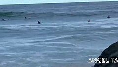 angel takemura goes topless for surfers at grumari-rj beach, wild scene