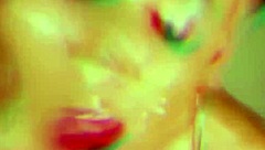 Busty redhead jerks hard cocks in gloryhole.