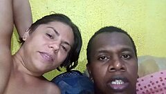 in the bedroom, a gay guy takes on a monster black cock