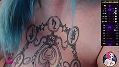 Webcam model interacts with swollen areas and juicy features on camera.