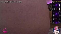 Webcam model interacts with swollen areas and juicy features on camera.