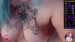 Webcam model interacts with swollen areas and juicy features on camera.