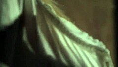 European Babe Rips Clothes Off in Seductive Striptease