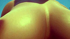 A pornstar engages in intimate activities in the oasis during a wild life expedition. The scene captures the beauty of nature.