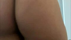 Curly-haired guy dancing funk with ass focus