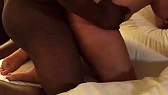 cuckold wife bends over for bbc while husband watches in silence.