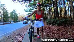 MsNovember's red thong pulled from ebony pussy after bike ride.
