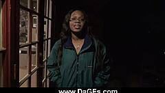 Ebony ball sucking outdoors.