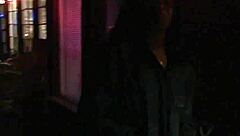 Ebony ball sucking outdoors.