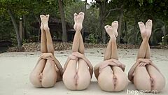 these four stunning girls bare it all on a nude beach.