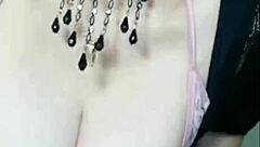 A woman with large breasts engages in seductive conversation