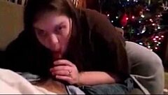 wife deepthroat husband dick on christmas for her gife wihe her swallowing mouth full