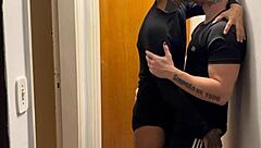 Young guys caught kissing hard on building camera footage