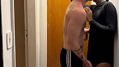 Young guys caught kissing hard on building camera footage