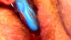 She rubs her hairy pussy again, building to cum.