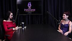 Annie Clementine records a group event with family support in sheer red.