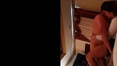 Young hotel girl in skirt teases wildly