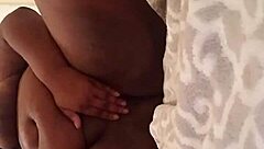 Retro ebony BBW teasing in blue film