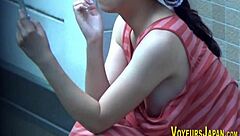 Asian babes have their side boobs spied on by a voyeur outdoors