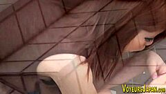 Asian babes have their side boobs spied on by a voyeur outdoors