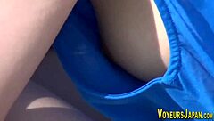 Asian babes have their side boobs spied on by a voyeur outdoors