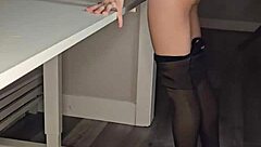 A young poetess reads her poetry with deep emotion in a stunning dress