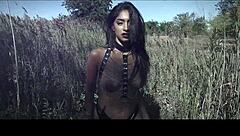 Is this sexy model topless in an outdoor photoshoot teasing you?