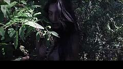 Is this sexy model topless in an outdoor photoshoot teasing you?