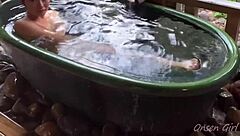 Sakura relaxes in hot springs with Nacchan