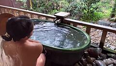 Sakura relaxes in hot springs with Nacchan