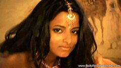 sensual bollywood babe captivates with erotic striptease dance