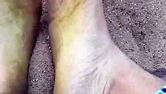 Barefoot Beauty Teases in Natural Sand Setting