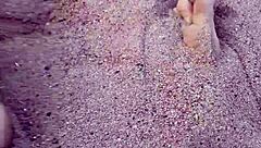 Barefoot Beauty Teases in Natural Sand Setting