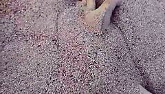 Barefoot Beauty Teases in Natural Sand Setting