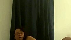 Hot damn! Mature Latina strips down wearing sexy glasses!