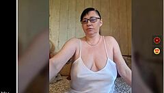 Tia Lucia rips clothes while dancing and flashing big nipples on camera